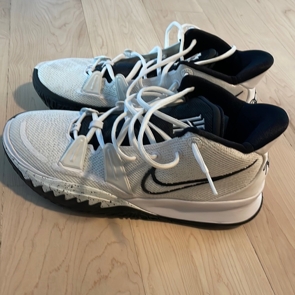Kyrie basketball shoes.  Worn twice then got too small.